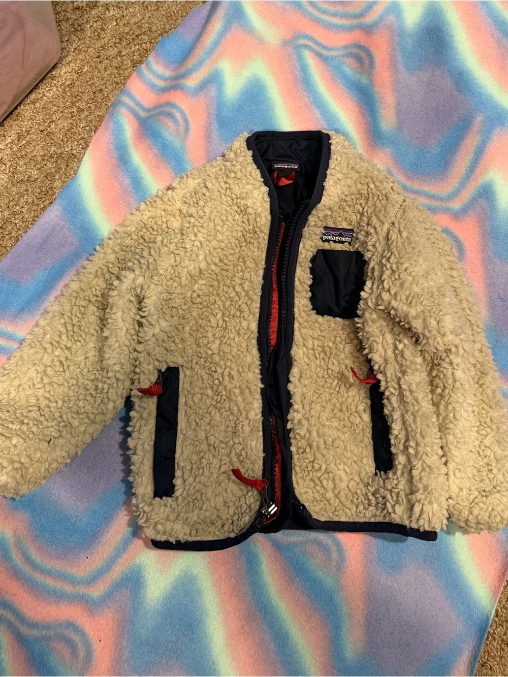 Patagonia Kids Cream Sherpa Jacket with Navy Trim and Red Zipper Accents